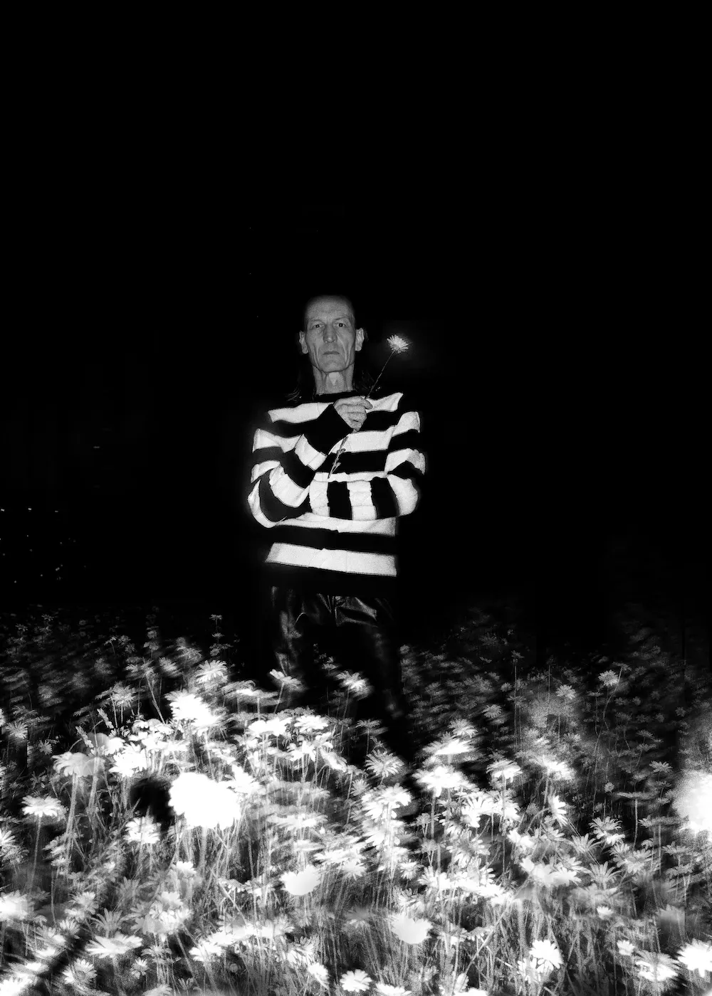 Sweater and trousers by ALEXANDER MCQUEEN