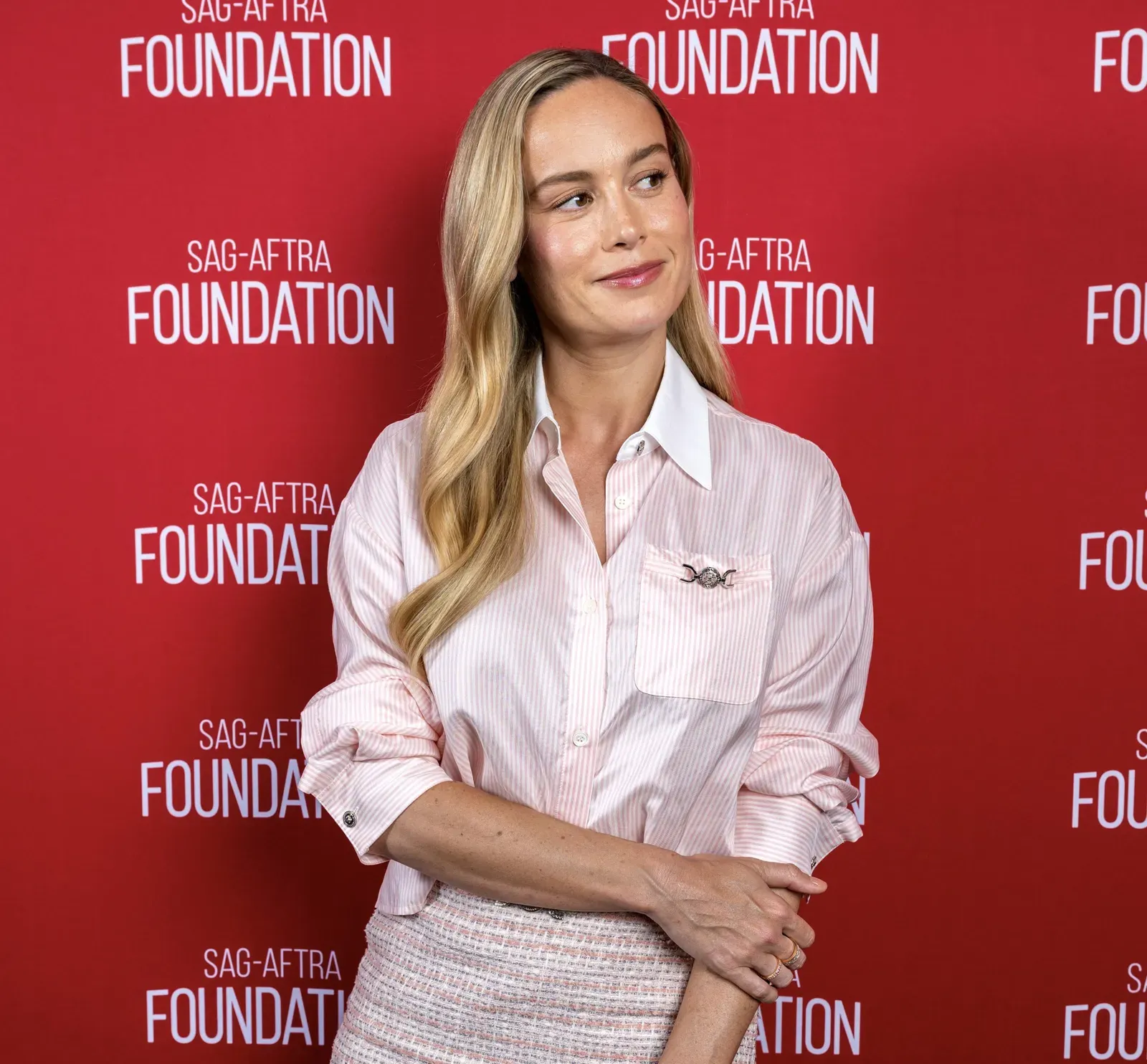 Brie Larson Dazzles in Versace: A Lesson in High-Fashion Chemistry