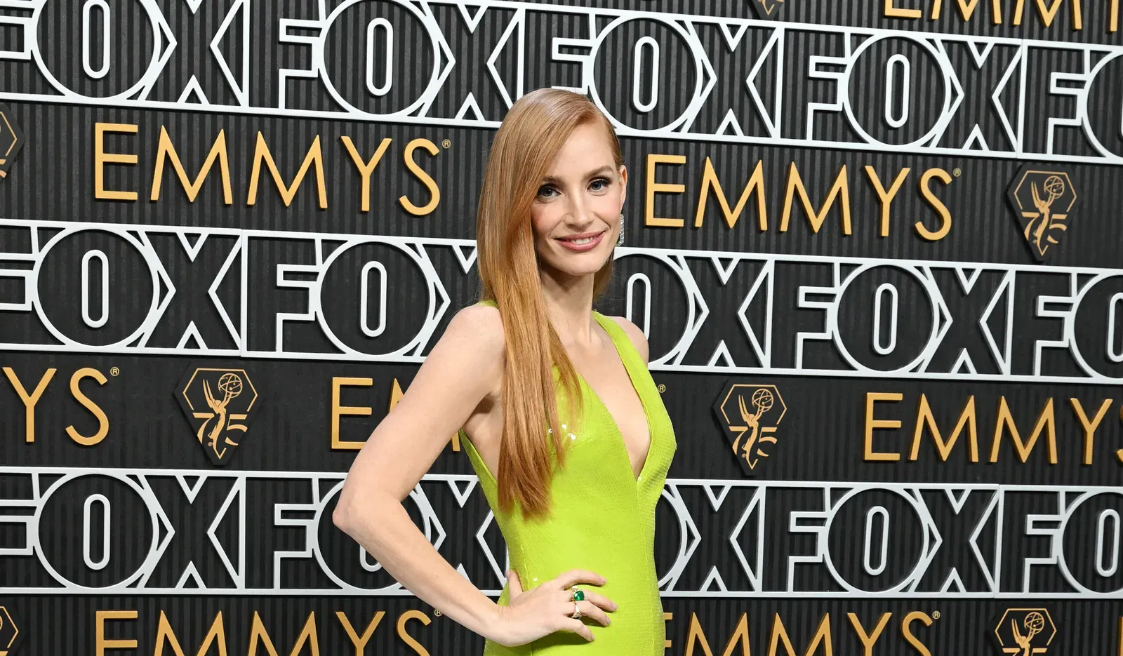 Jessica Chastain in a vibrant lime green gown at the 75th Primetime Emmy Awards.