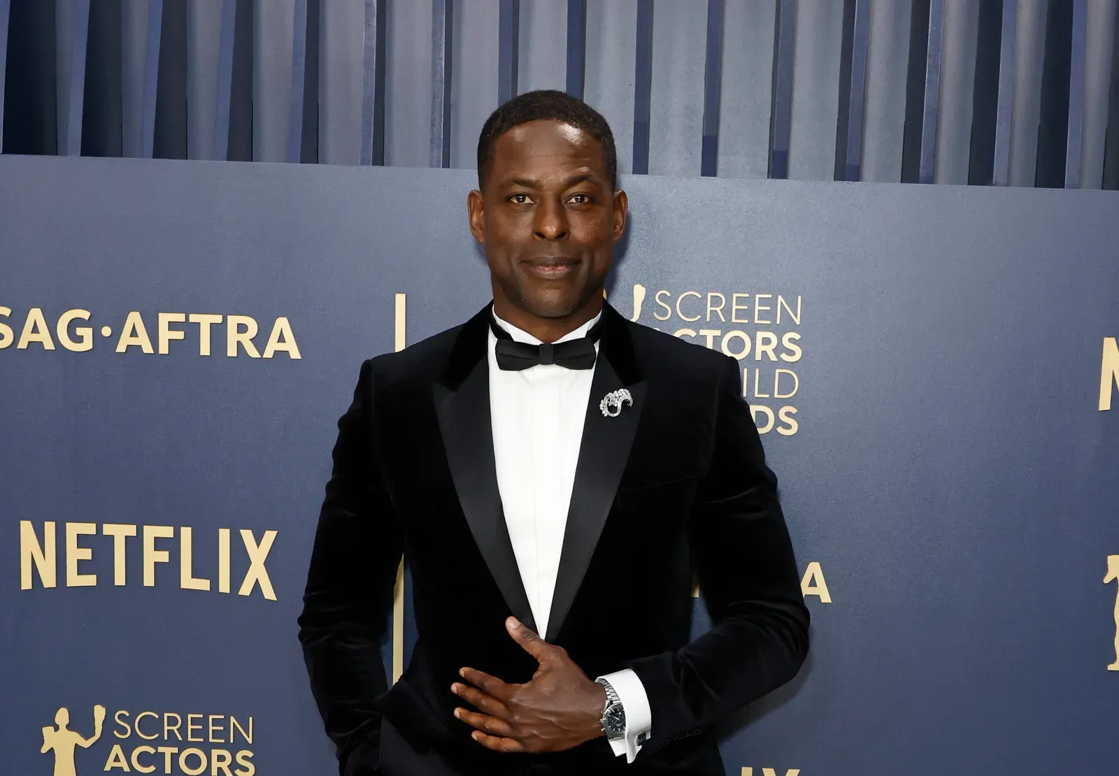 Sterling K. Brown in a black tuxedo at the 2024 SAG Awards.