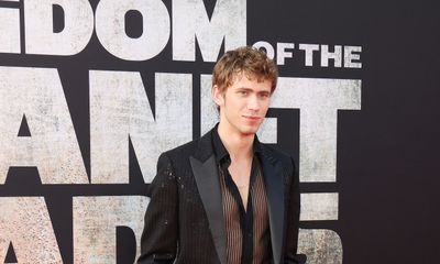 Owen Teague Shines in CELINE HOMME at the ‘Kingdom of the Planet of the Apes’ LA Premiere