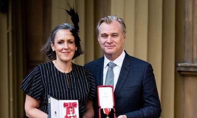 Sir Christopher Nolan Receives Knighthood In Dior Men At Buckingham Palace