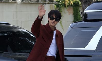 Jin of BTS Stuns in Charming Gucci Burgundy Ensemble for Fall