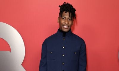 Jon Batiste Embraces Valentino ‘Avant les Débuts’ in Navy and Cream Prelude