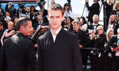 Oliver Stone, Saul Nanni, and Souheila Yacoub Shine in Dior at the 77th Annual Cannes Film Festival
