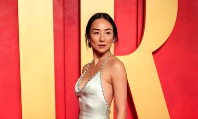 Greta Lee Stuns in Custom LOEWE Silk Gown at Vanity Fair’s 2024 Oscar Party