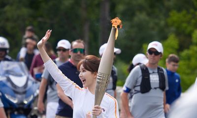 Rosy Zhao Carries the Olympic Torch in Versace, Igniting the Spirit of the 2024 Summer Olympics