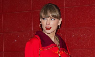 Taylor Swift Stuns in Red Versace at Chiefs vs. Raiders Game