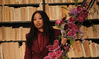 Dominique Fishback Captivates in Monochrome Chic Sergio Hudson Ensemble at Creative Class Event