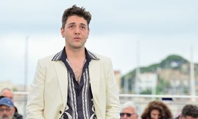 Legendary Filmmaker Xavier Dolan Enchants Cannes in Versace’s “La Vacanza” Collection