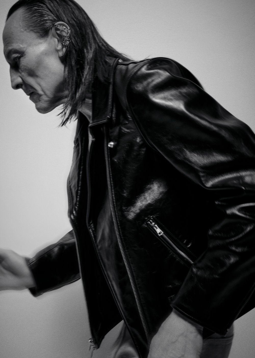 Jacket and denim by OUR LEGACY, ear cuffs by ALEXANDER MCQUEEN