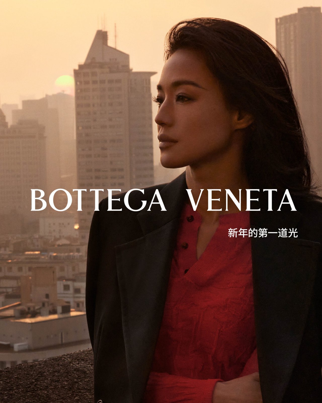 Greeting the Lunar New Year, silhouetted against the dawn of Shanghai’s skyline, Ken Ngan captures Bottega Veneta’s vision of elegance and renewal.
