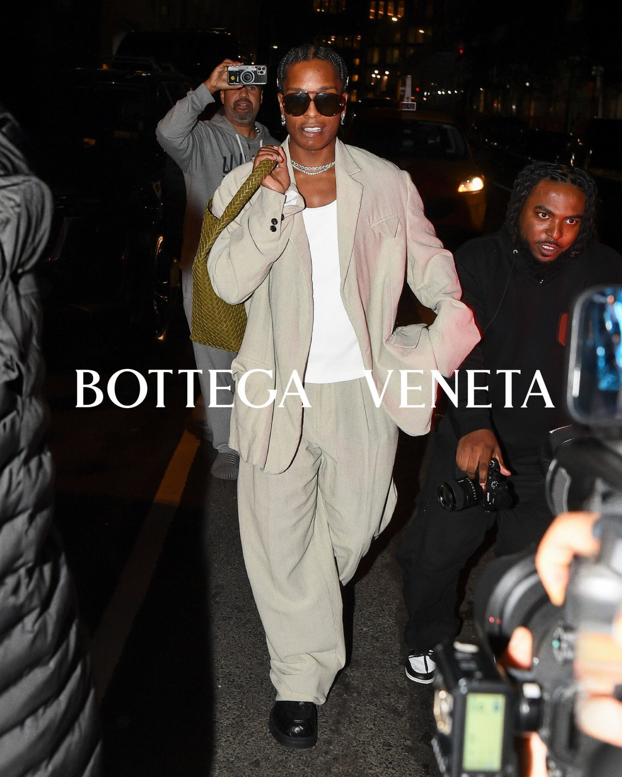 A$AP Rocky navigates the urban jungle in Bottega Veneta, showcasing the intersection of luxe tailoring and street-savvy edge.