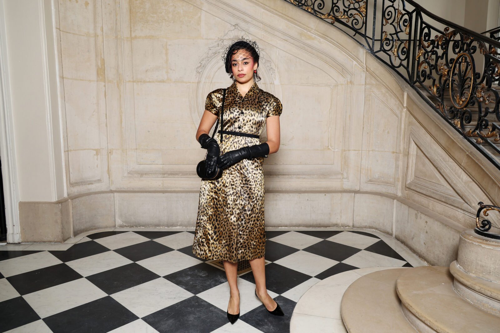 Celeste Epiphany Waite wore a Dior Fall-Winter 2023-2024 printed silk dress and a Dior hat, bag and shoes.