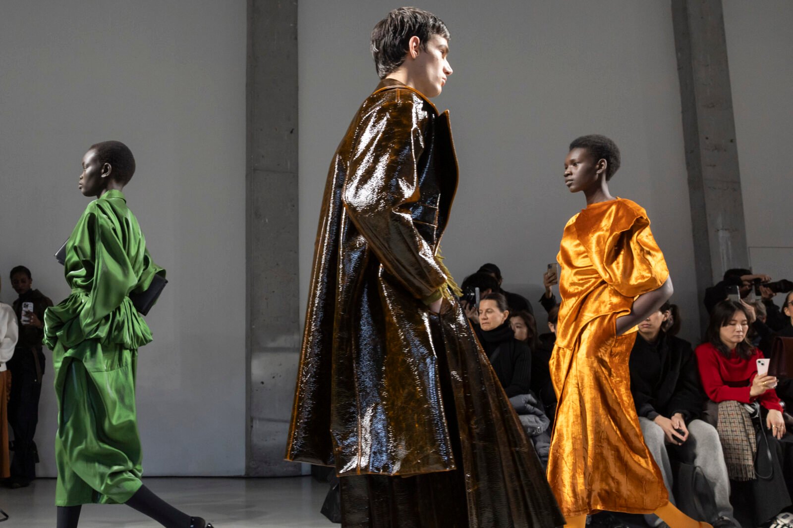 Striding into the future: Dawei's latest collection channels classic elegance with modern edge, as models in lustrous metallics and vibrant silks capture the spirit of fashion's new era.