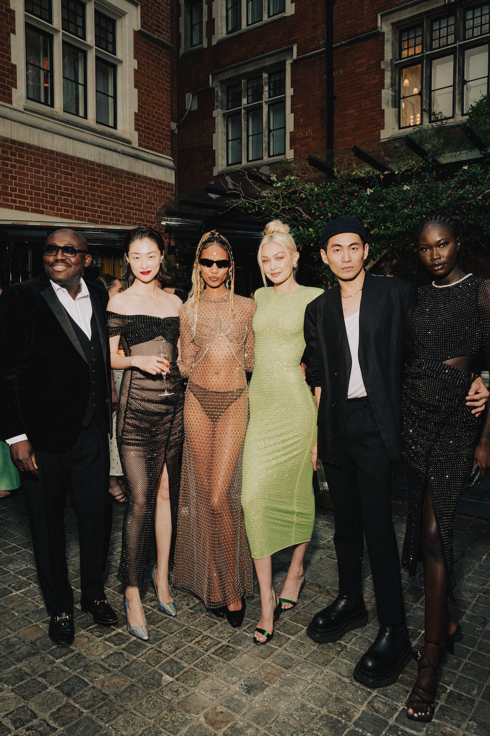 Edward-Enninful-OBE-Chu-Wong-Adesuwa-Gigi-Hadid-Han-Chong-and-Adhel-Bol-at-the-self-portrait-x-British-Vogue-Summer-Party-2022_1.jpg