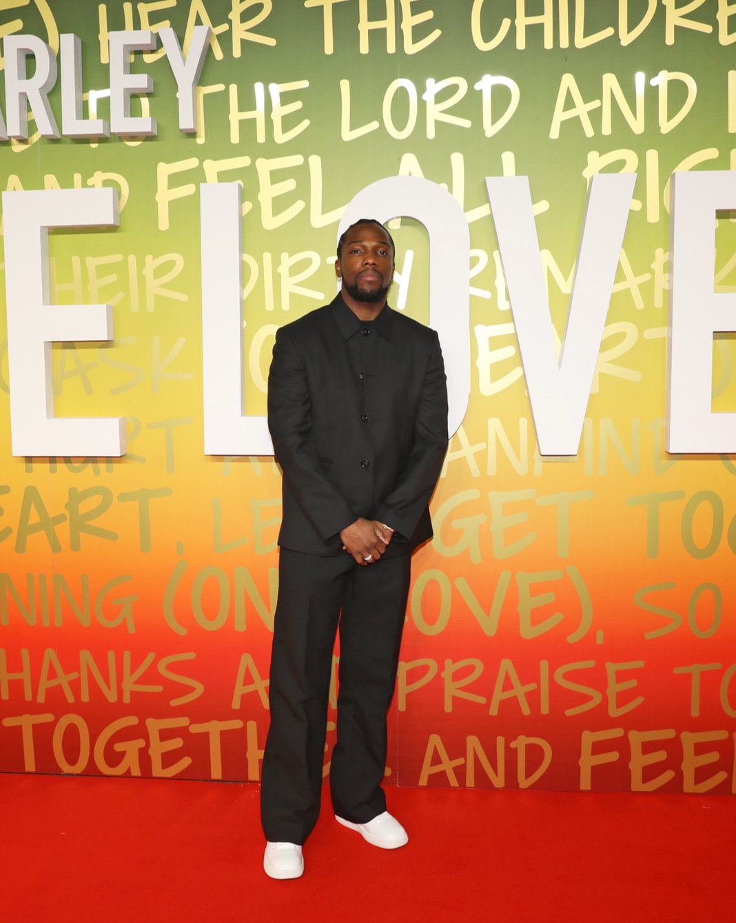 Tosin Cole: An Epitome of Burberry’s Sophistication at the “One Love” Premiere