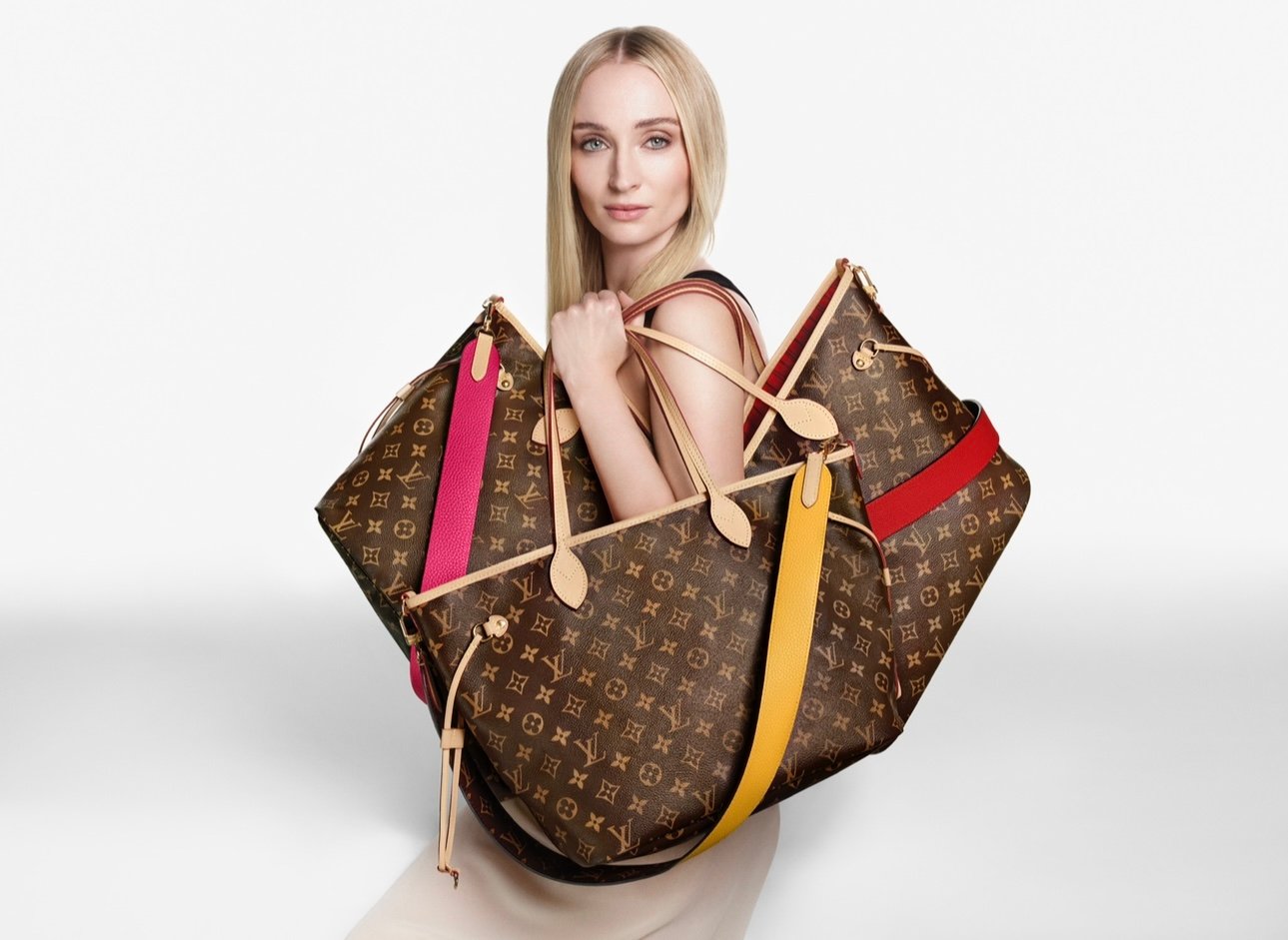 Sophie Turner stars as muse for the new Louis Vuitton Inside Out Collection, with the bag exterior facing.