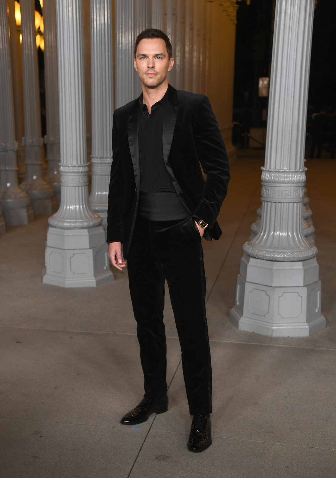 Nicholas Hoult inside LACMA's classical colonnade wearing Dior Men by Kim Jones (Photo by Alberto E. Rodriguez/WireImage)