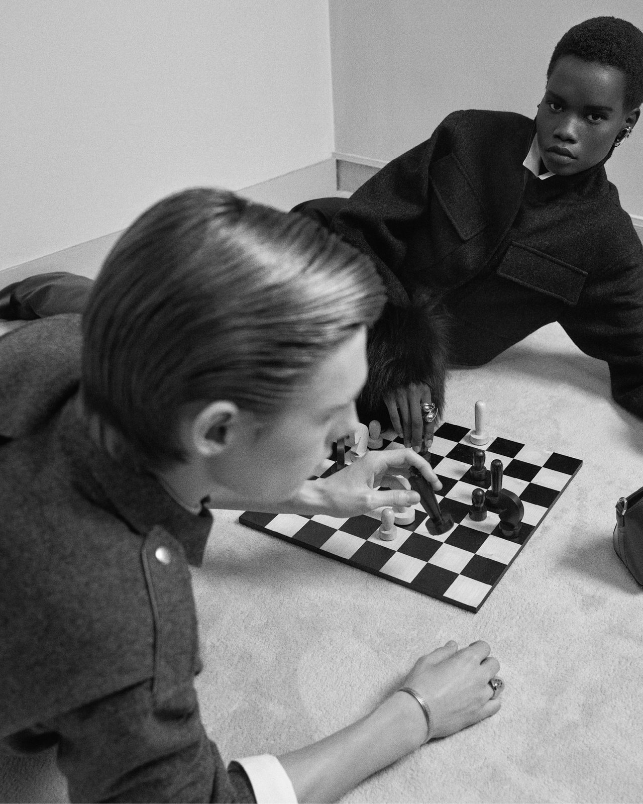 Mary Ukech and Milo De Clerk play a game of chess in Givenchy's Holiday 2024 campaign (Photo: Courtesy of Givenchy)