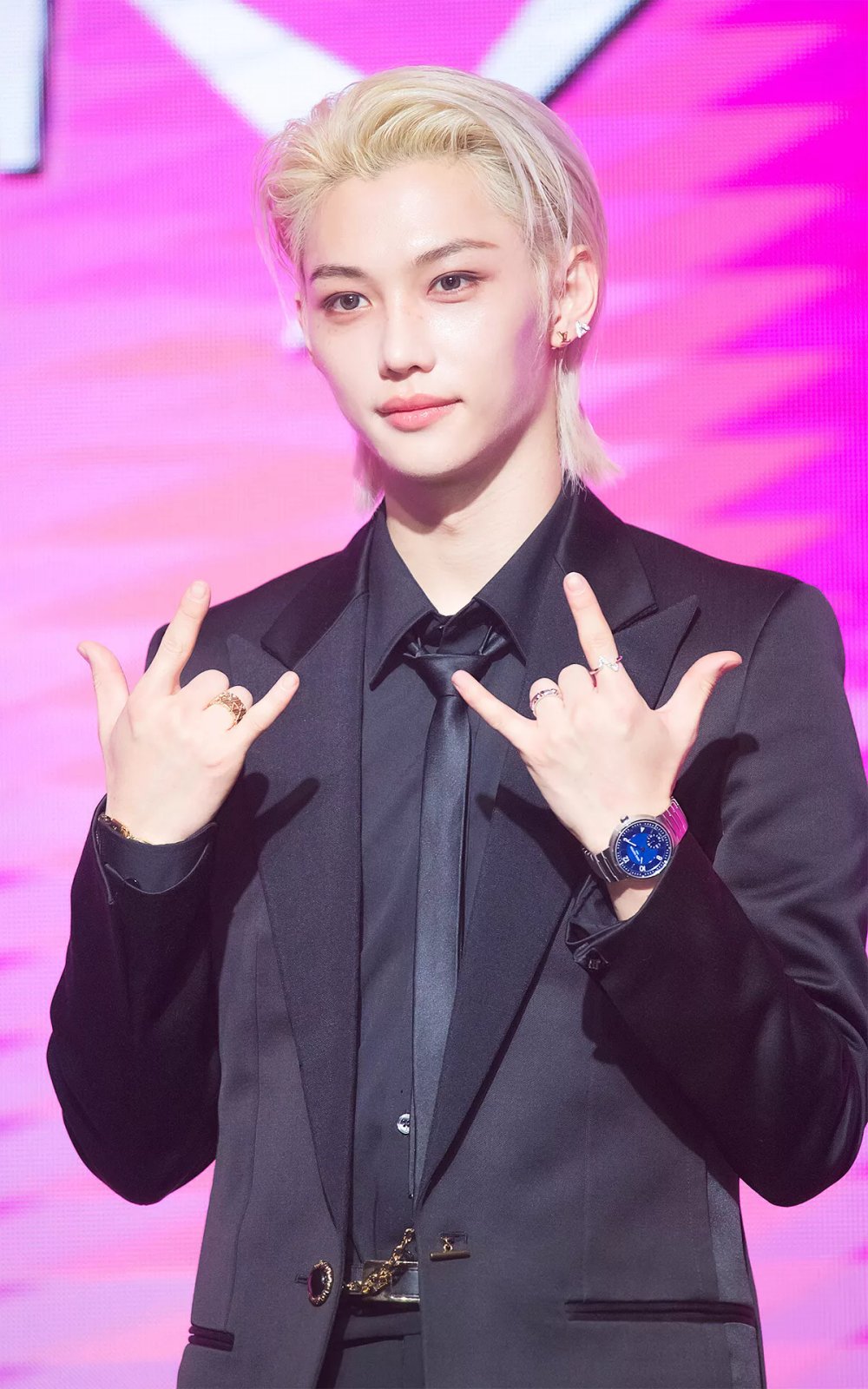 "Felix of Stray Kids exudes charm in a Louis Vuitton black tuxedo and accessorizes with the brand’s signature fine jewelry, making a bold fashion statement at the