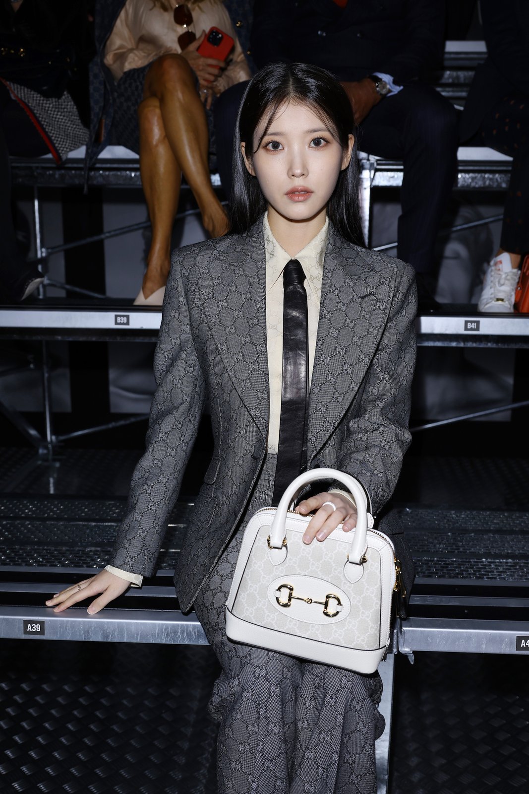 IU is seen at the Gucci Show during Milan Fashion Week Spring/Summer 2023