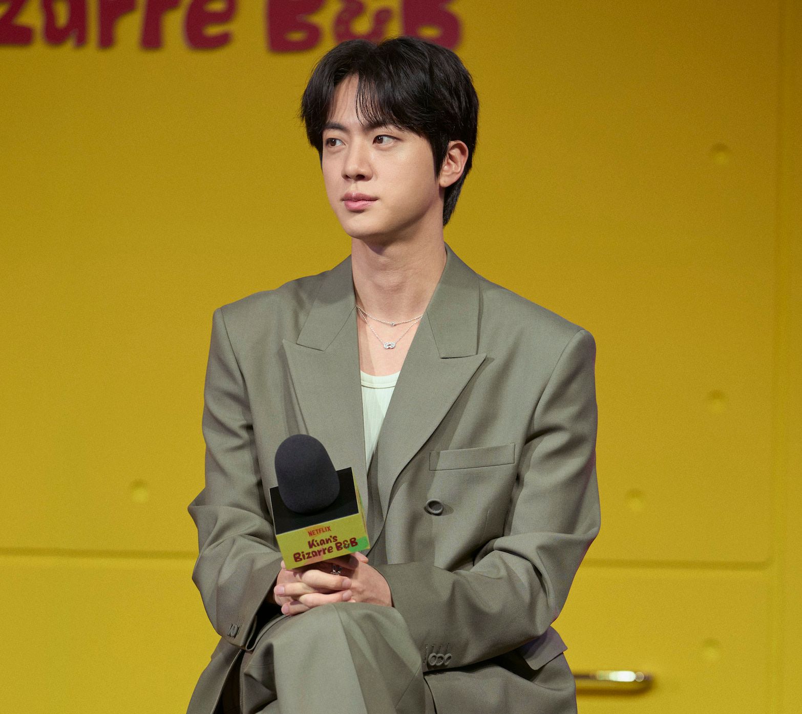 Jin of BTS Stuns in Gucci at Kian’s Bizarre B&B Press Conference