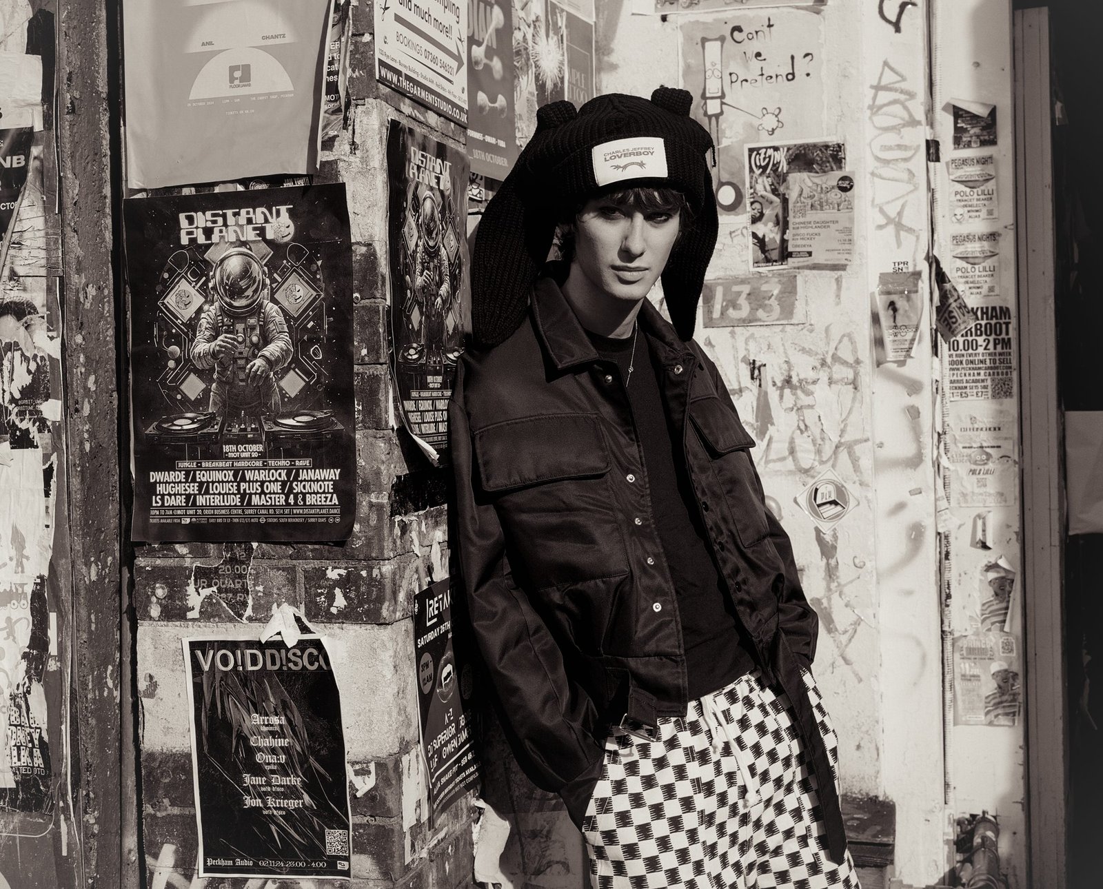 Jack wears Hat: Charles Jeffrey Loverboy Necklace: Needles Jacket: Denzil Patrick T-shirt: Vintage Shorts: Service Works