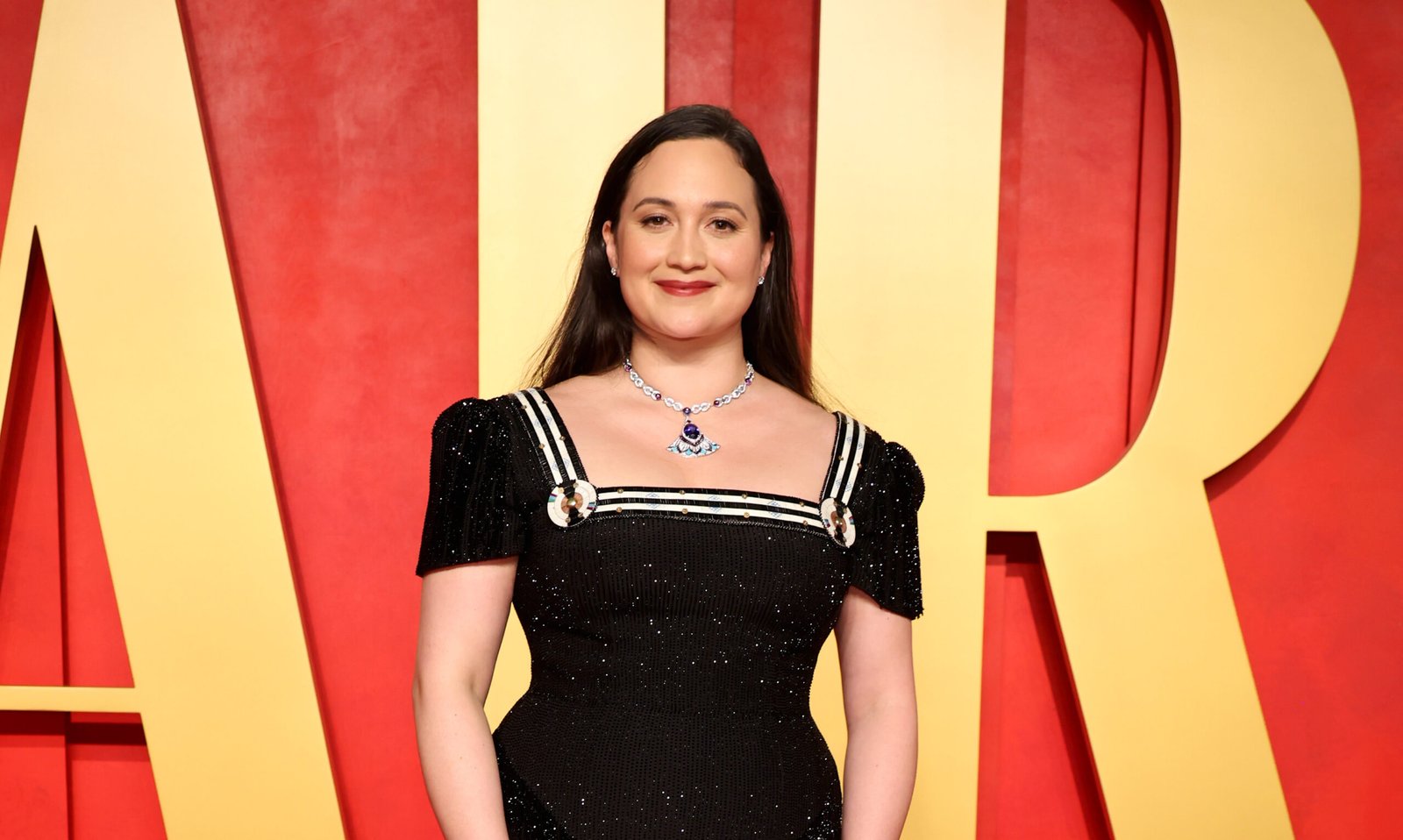 Lily Gladstone graces the Vanity Fair Oscars Party red carpet in a bespoke Gucci gown featuring Indigenous quillwork.