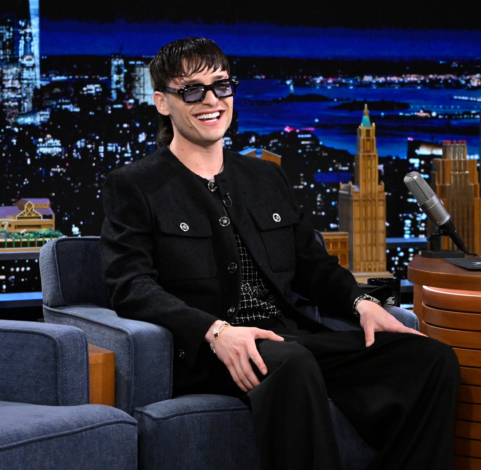 Peso Pluma Stuns in Versace on The Tonight Show with Jimmy Fallon: The Captivating Fusion of Corridos Tumbados and High Fashion