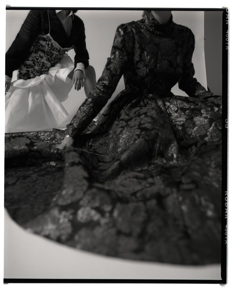 Robin wears dress by ERDEM. Nike wears dress by RODARTE, cardigan by TOGA ARCHIVES, shirt stylist’s own