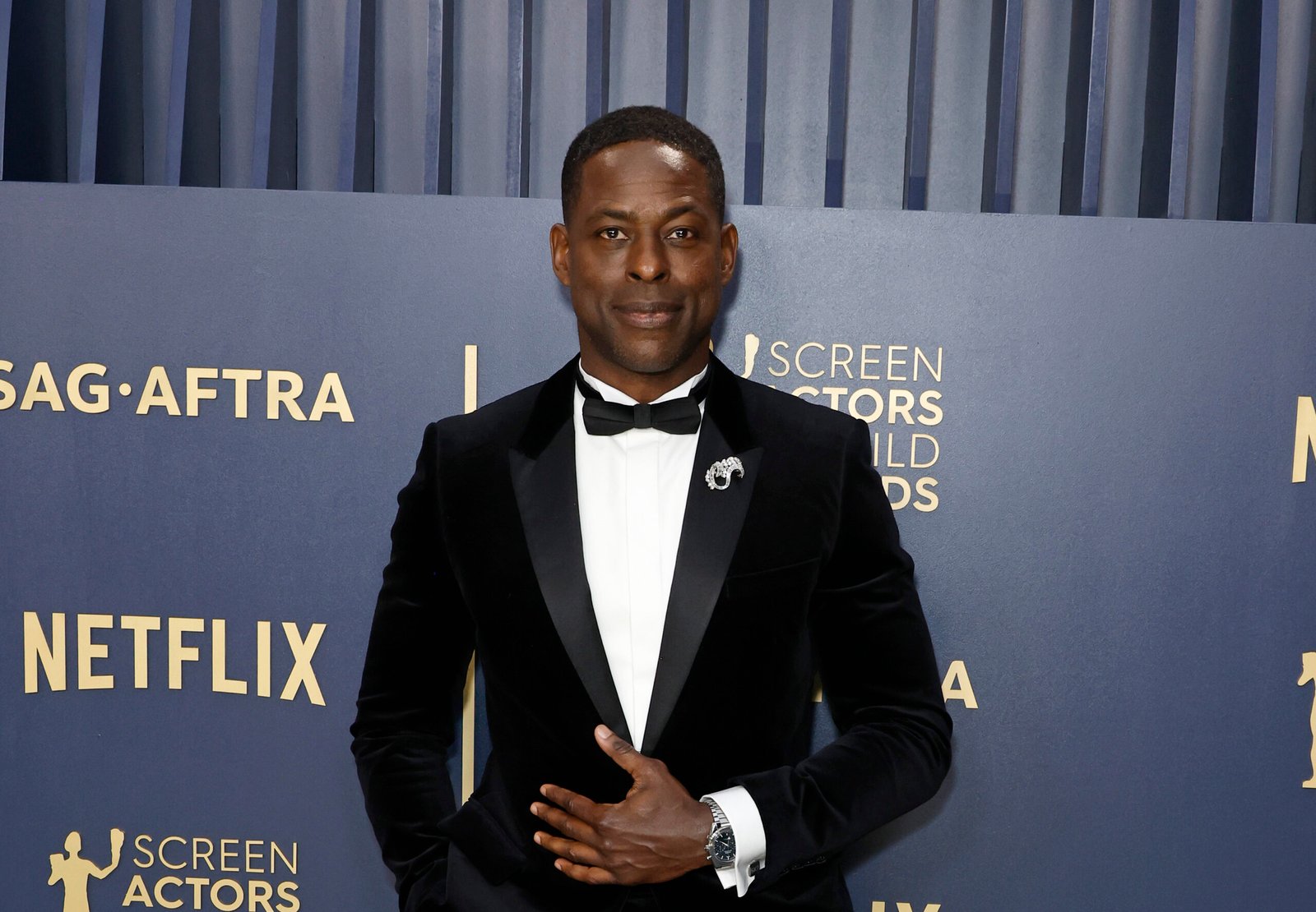 Sterling K. Brown in a black tuxedo at the 2024 SAG Awards.