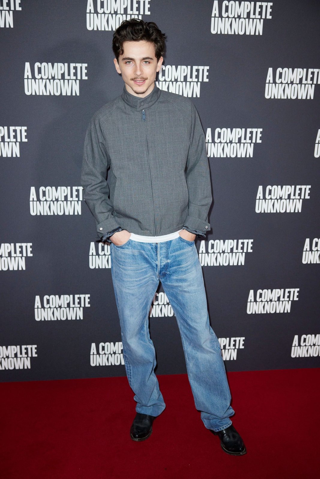 Timothée Chalamet's modern take on red carpet style at "A Complete Unknown" premiere in London. (Photo by StillMoving.Net/Shutterstock)