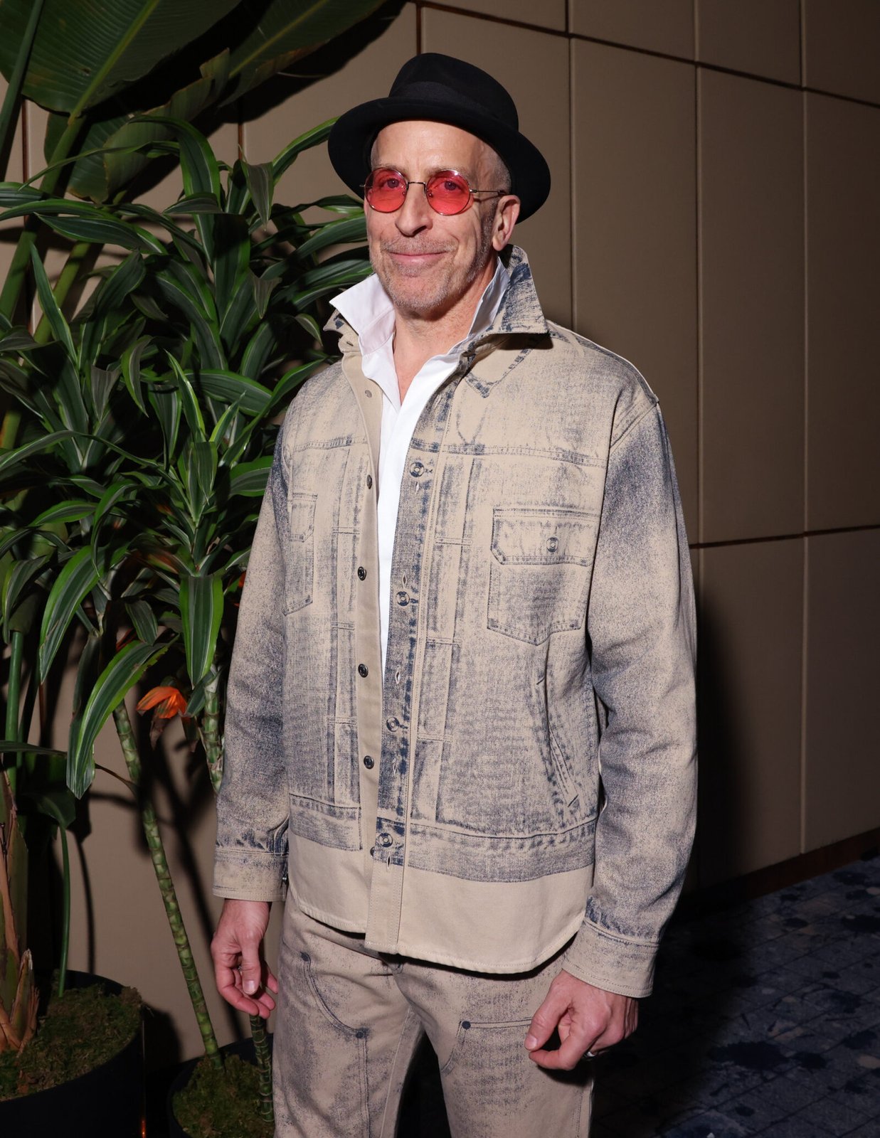 Todd A. Kessler, the creative force behind "The New Look", steps out at the series' premiere, exuding a casual yet distinctive flair, perfectly complementing the artistic spirit of the occasion.