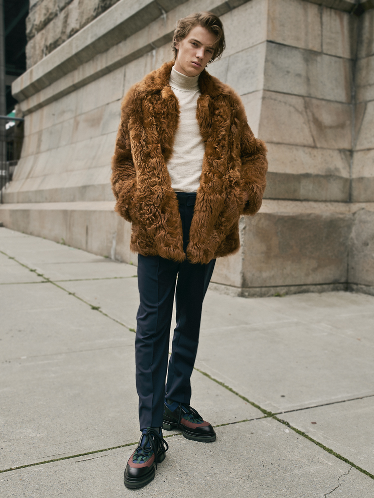 Coat by SIES MARJAN, turtleneck by HUGO BOSS, pants by KENZO, shoes by PIERRE HARDY
