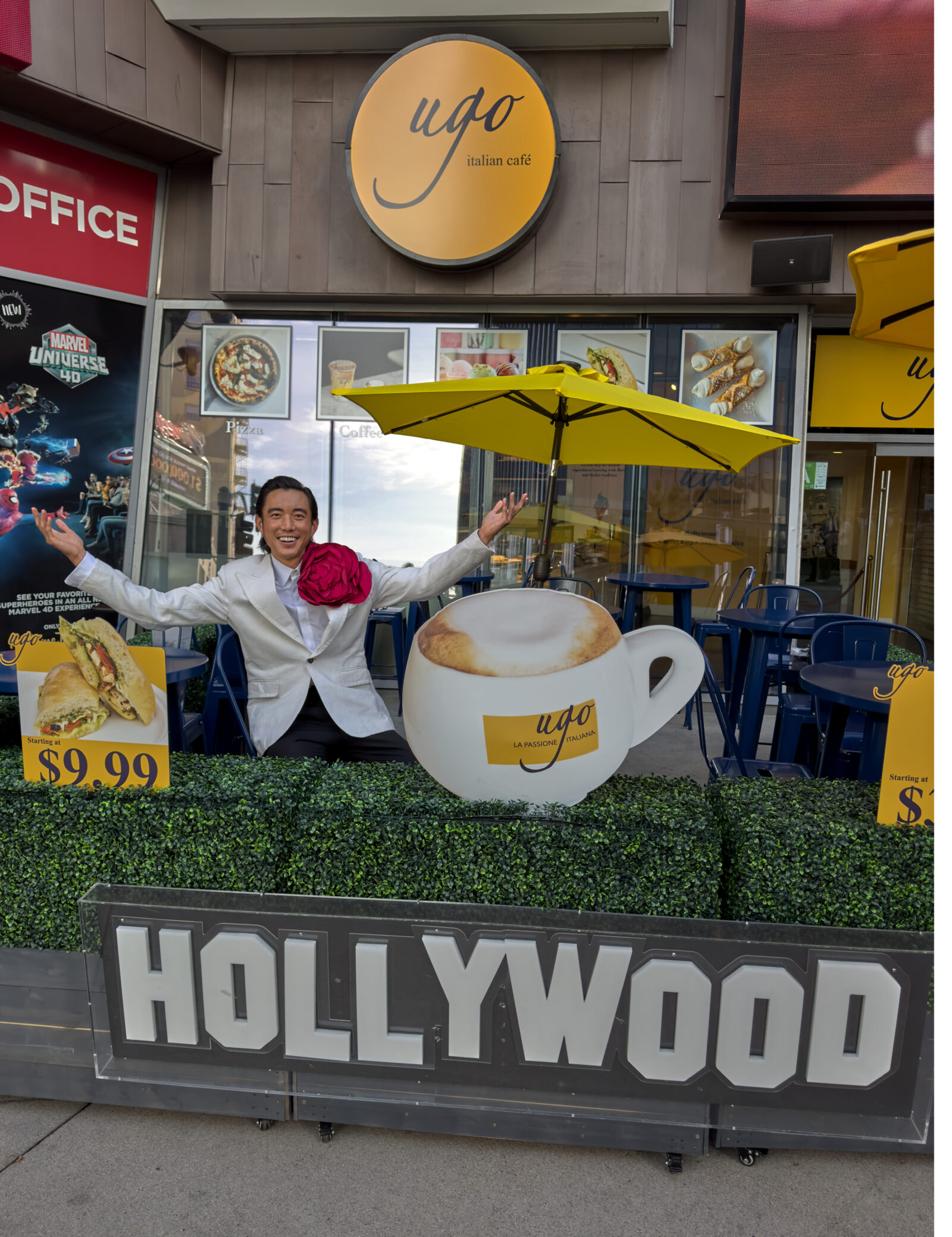 Justin H. Min exuberantly embraces the spirit of Hollywood at the Ugo Italian Café, capturing the essence of the cinematic haven that features in W Magazine's 2024 Best Performances Portfolio. (Photo Credit: Juergen Teller for W Magazine)