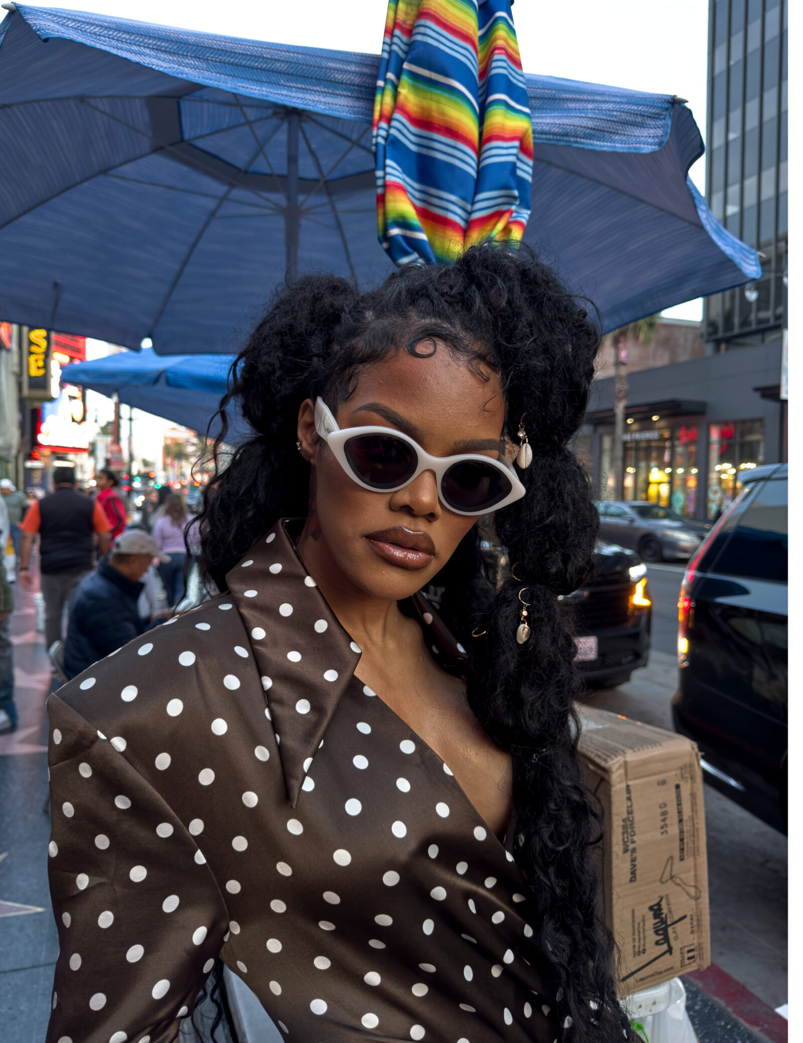 Teyana Taylor strikes a pose on Hollywood Boulevard, infusing the bustling streets with her iconic style, as featured in W Magazine's 2024 Best Performances Portfolio. (Photo Credit: Juergen Teller for W Magazine)