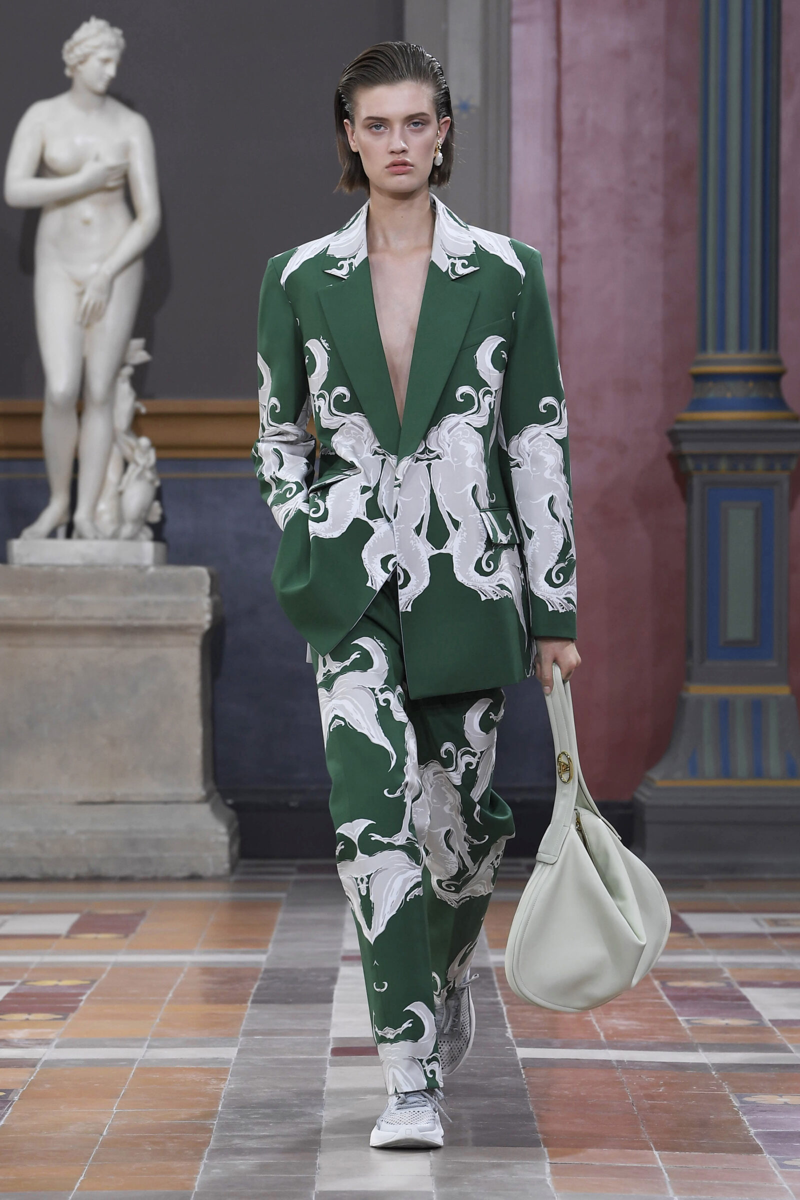 A Valentino gown captures the architectural grace of Piccioli’s design, illustrating the art of precision in fashion.