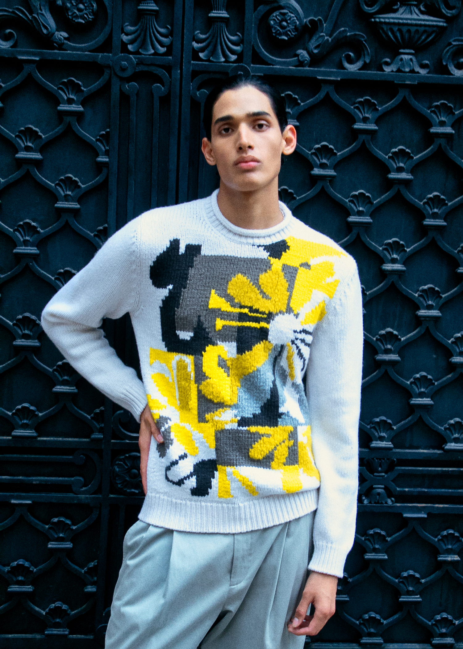 Sweater and trousers by HERMÈS, earrings, model's own Sweater and trousers by HERMÈS, earrings, model