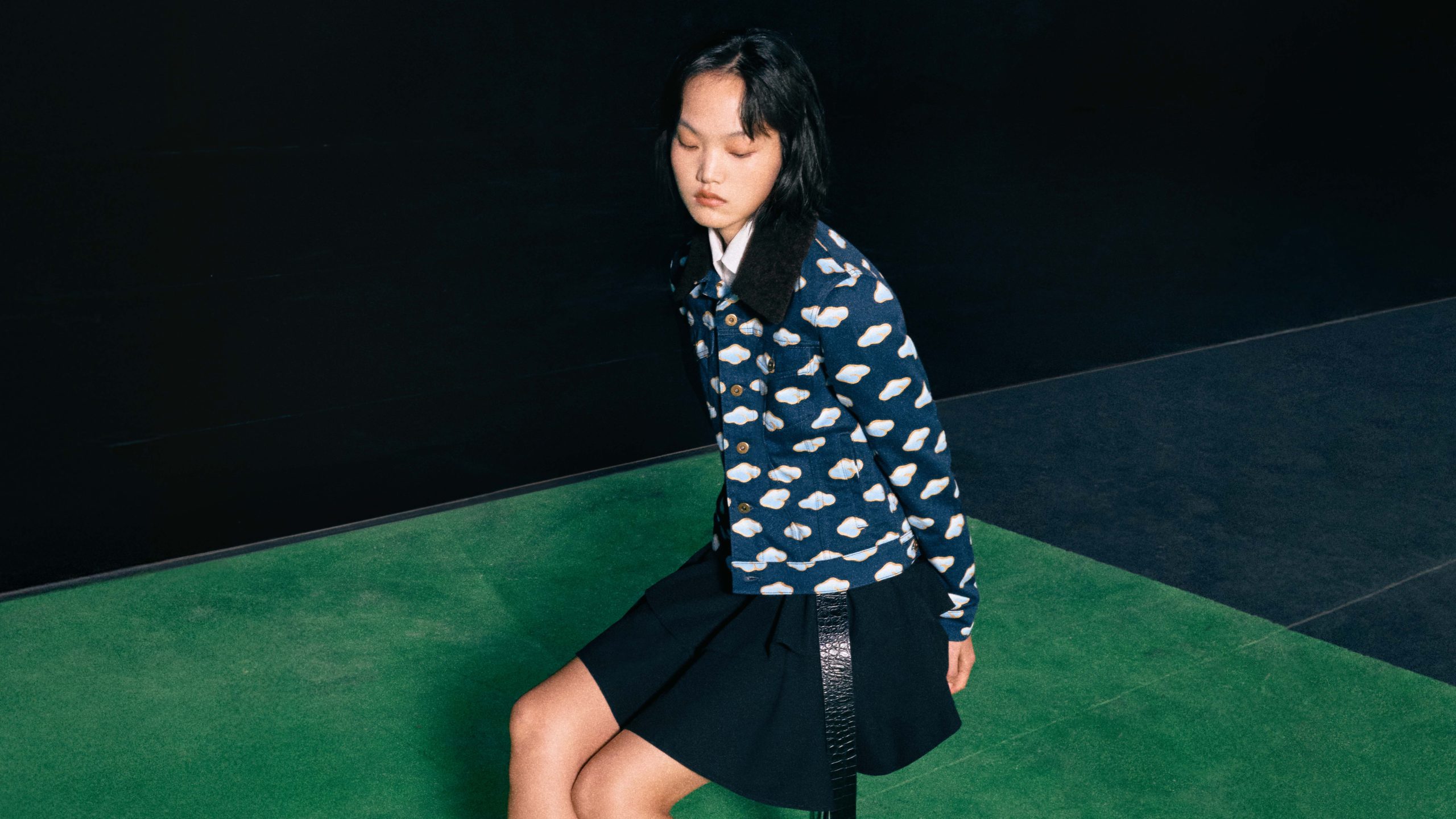 Navy jacket with shearling collar featuring cloud print; a look into the collection's motifs (Photo: Courtesy of LOEWE)
