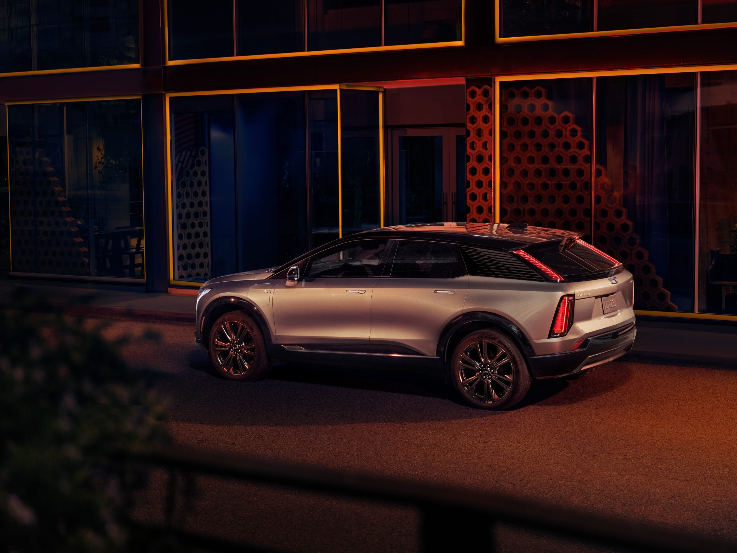 The 2025 Cadillac OPTIQ in Argent Silver Metallic combines bold lighting design and sophisticated surfacing, highlighted by 21-inch alloy wheels and a distinctive fastback silhouette. (Photo: Courtesy of Cadillac)
