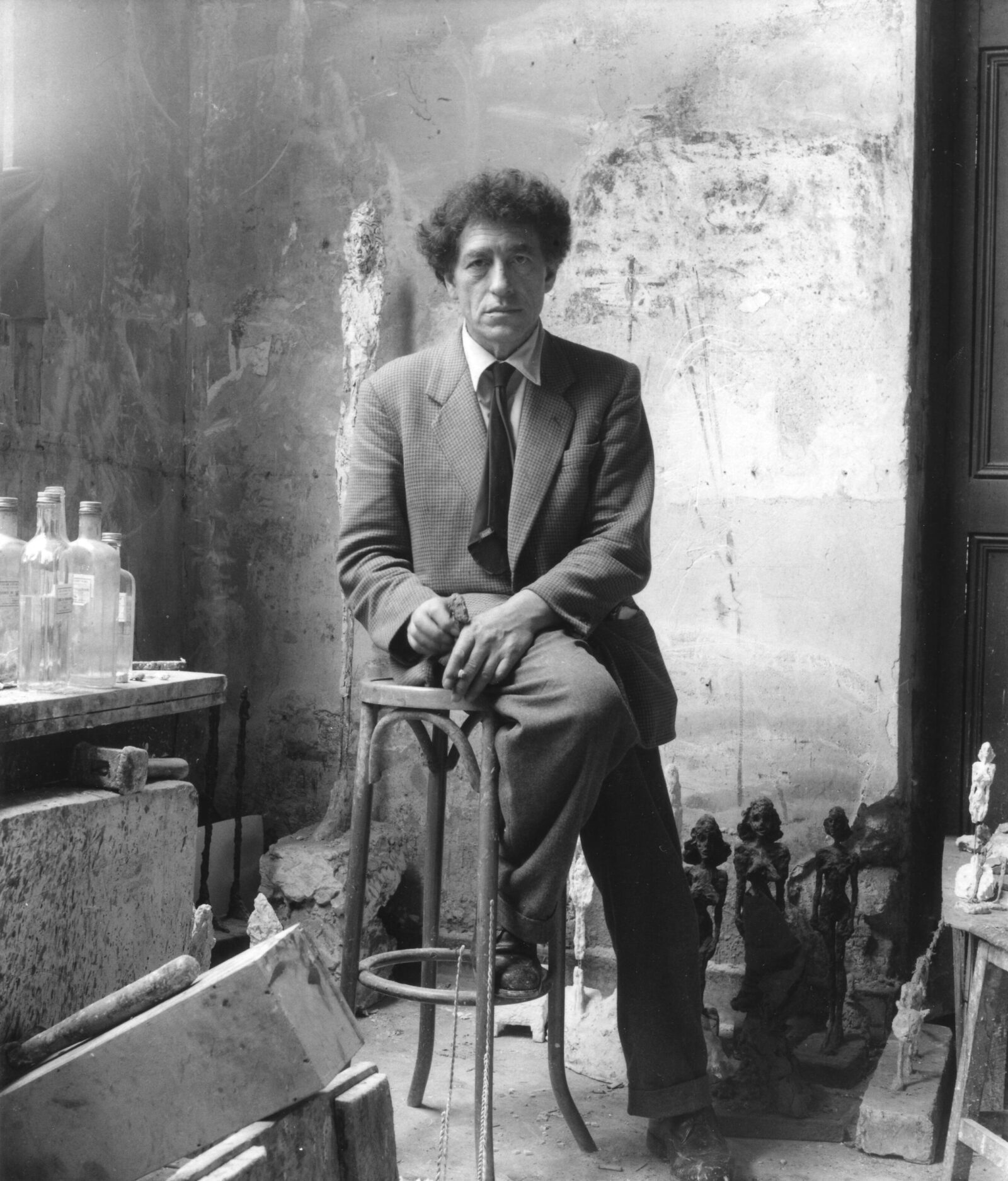 Denise Colomb, Alberto Giacometti in His Studio, Paris, c. 1954, silver print on paper, Archives, Fondation Giacometti. © Ministère de la culture - Médiathèque du Patrimoine, Dist. RMN-Grand Palais / Denise Colomb Denise Colomb, Alberto Giacometti in His Studio, Paris, c. 1954, silver print on paper, Archives, Fondation Giacometti. © Ministère de la culture - Médiathèque du Patrimoine, Dist. RMN-Grand Palais / Denise Colomb