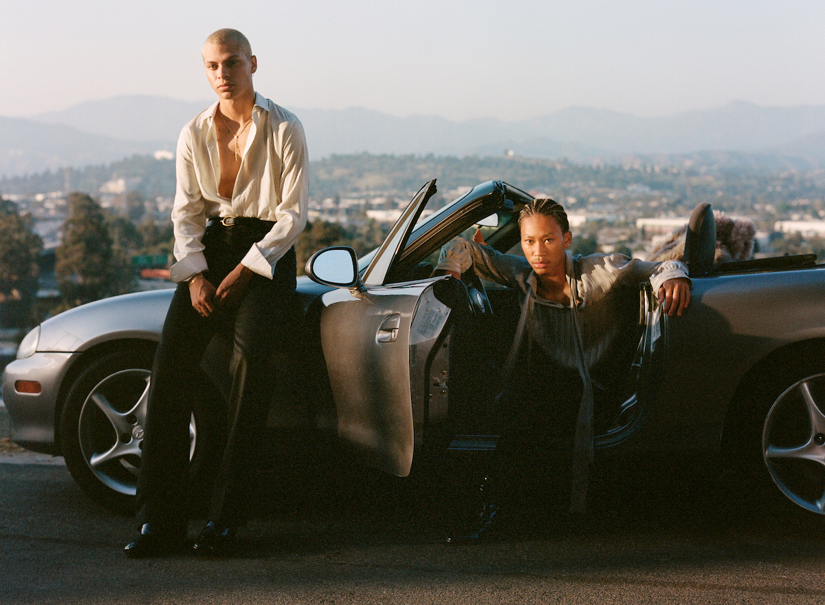Marcos and Lil Dre wear full looks by SAINT LAURENT
