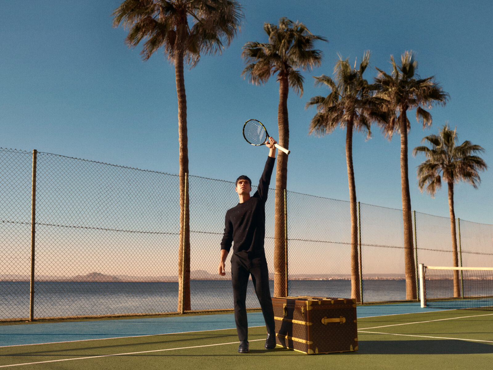 Master of the Court: Carlos Alcaraz with the Louis Vuitton Malle Vestiaire, where craftsmanship meets athletic brilliance.