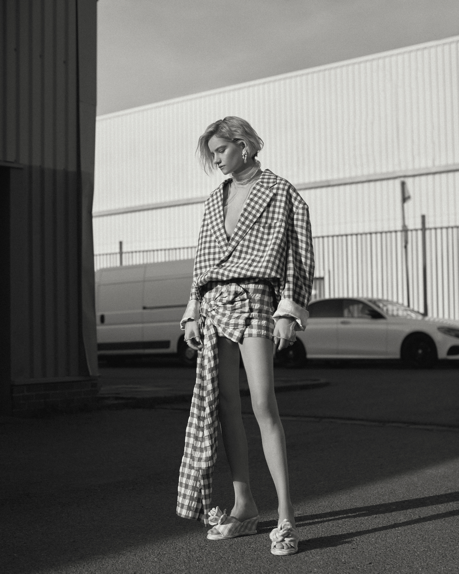 Full look by ACNE STUDIOS, earrings by COMPLETED WORKS