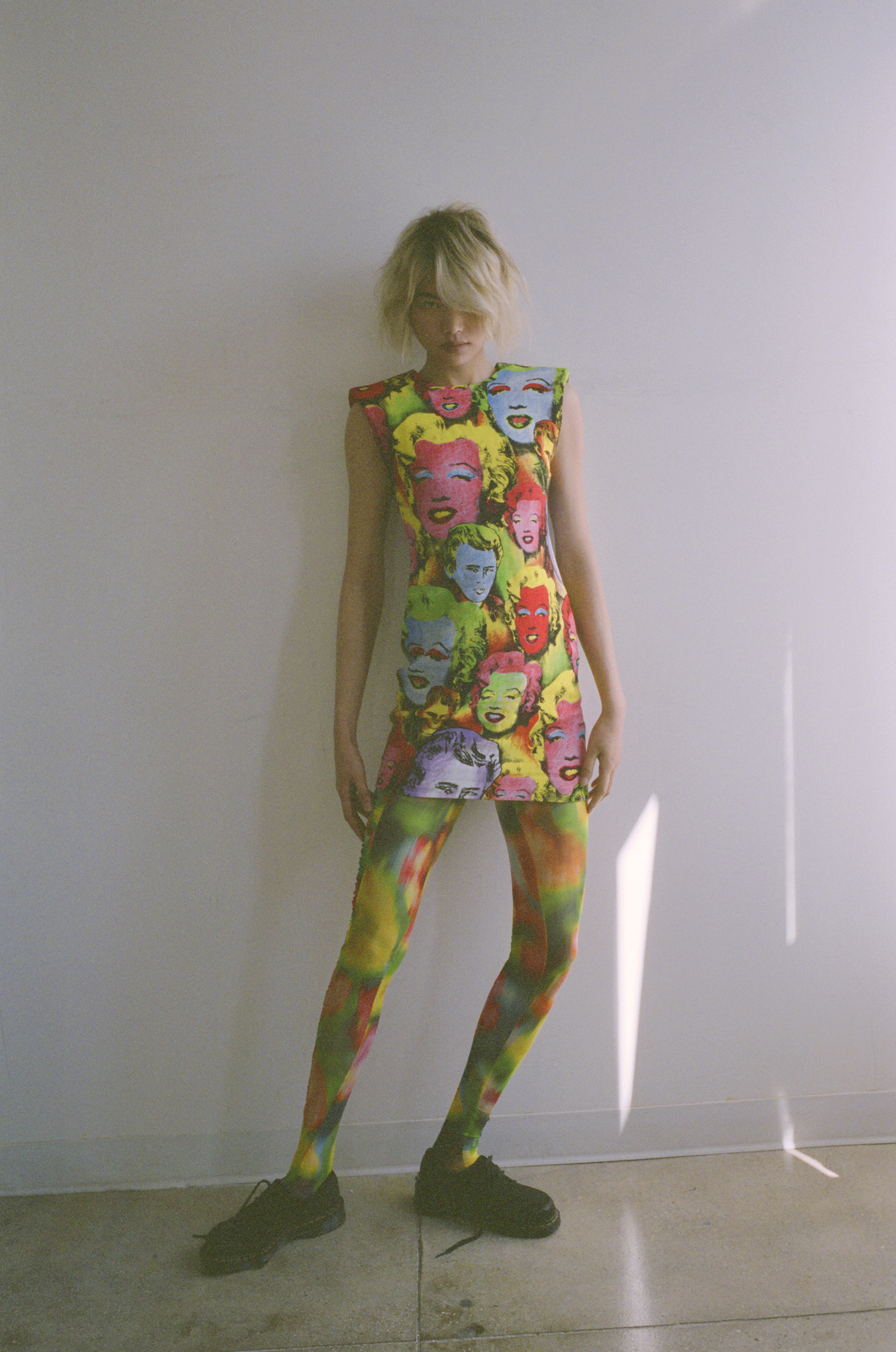 Dress by VERSACE, tights by DRIES VAN NOTEN, shoes, DR. MARTENS, Joluxe