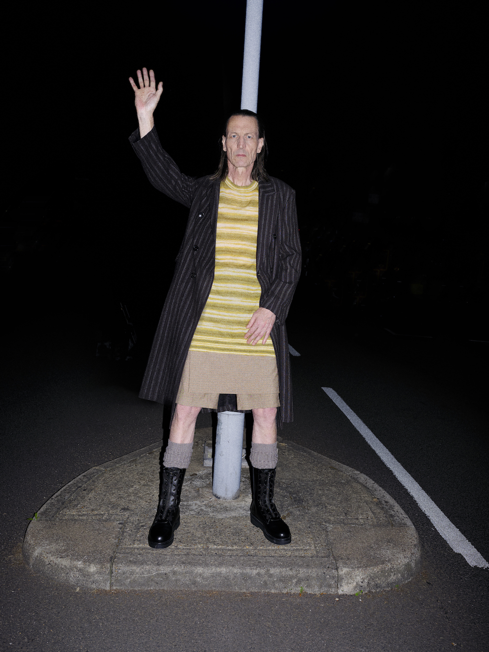 Coat by OUR LEGACY, top and short by DRIES VAN NOTEN, socks by RICK OWENS, boots by VALENTINO Coat by OUR LEGACY, top and short by DRIES VAN NOTEN, socks by RICK OWENS, boots by VALENTINO