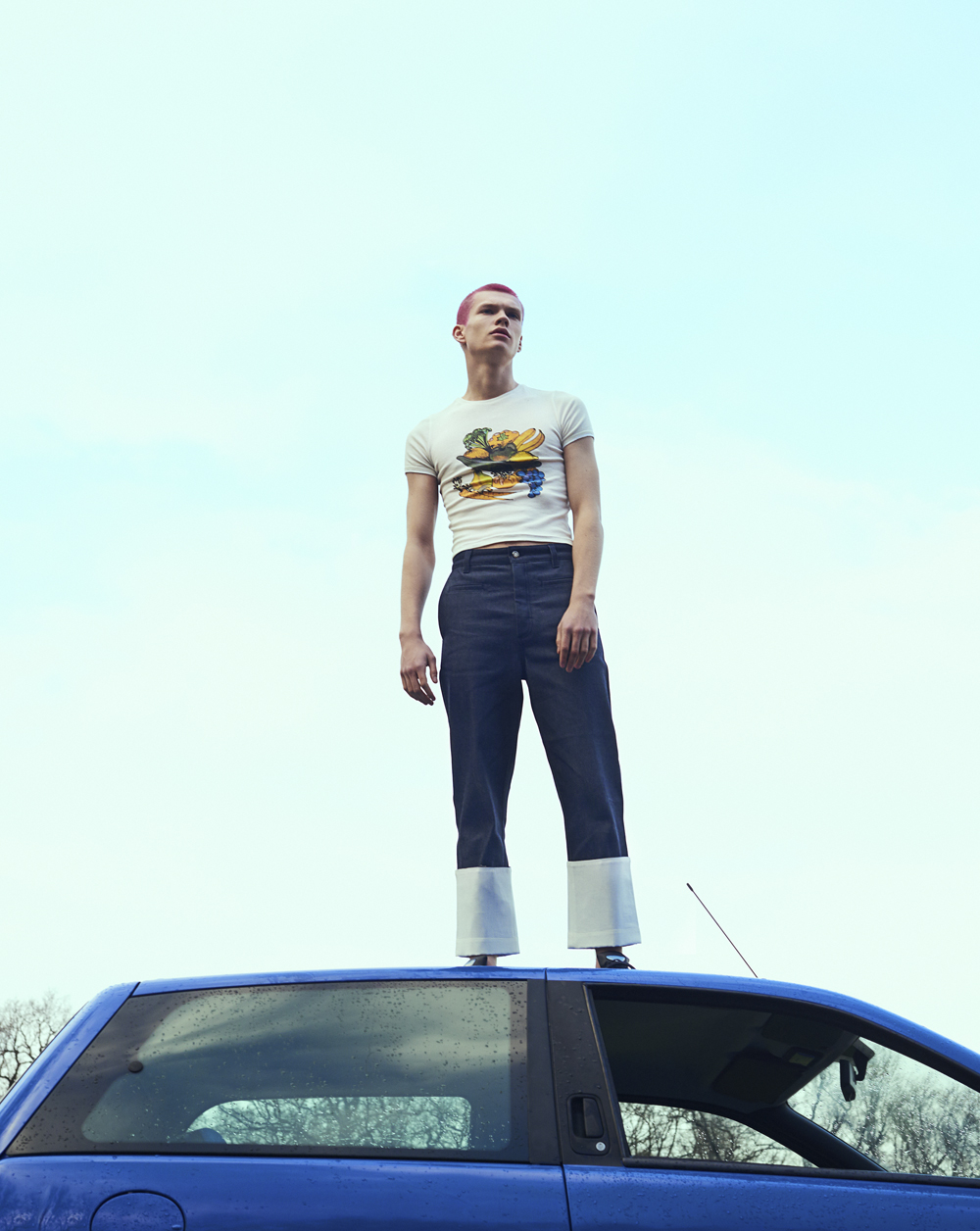 t-shirt by LAZOSCHMIDL, jeans by LOEWE, shoes by RAF SIMONS