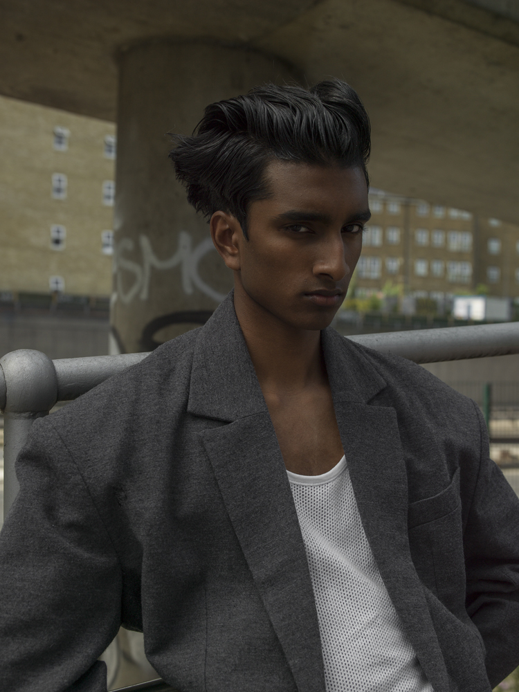 Jacket by CHIN MENSWEAR INTL, tank by CALVIN KLEIN
