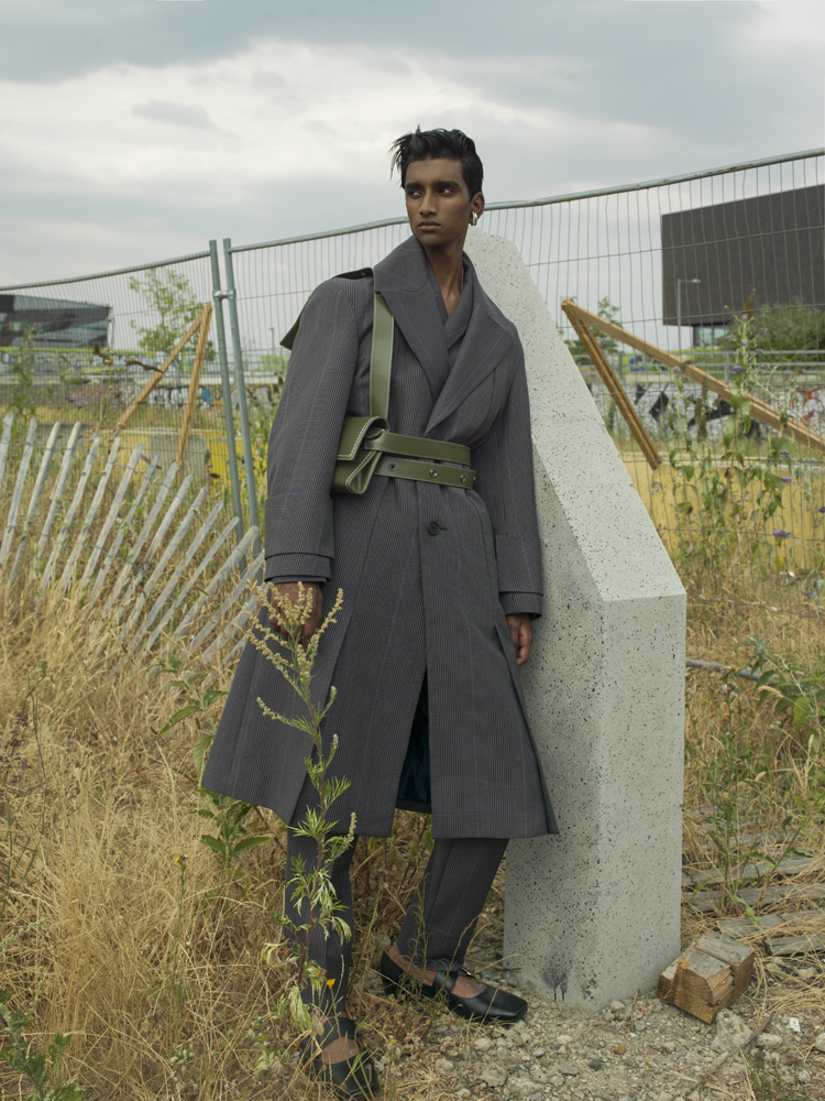 Coat, jacket, pants, and bag by WOOYOUNGMI, earring by ALAN CROCETTI shoes by ROCKER